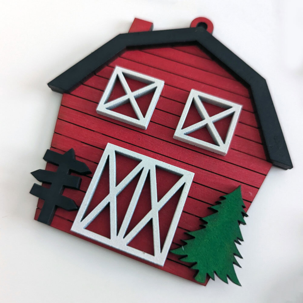 Christmas tree ornament in shape of red barn