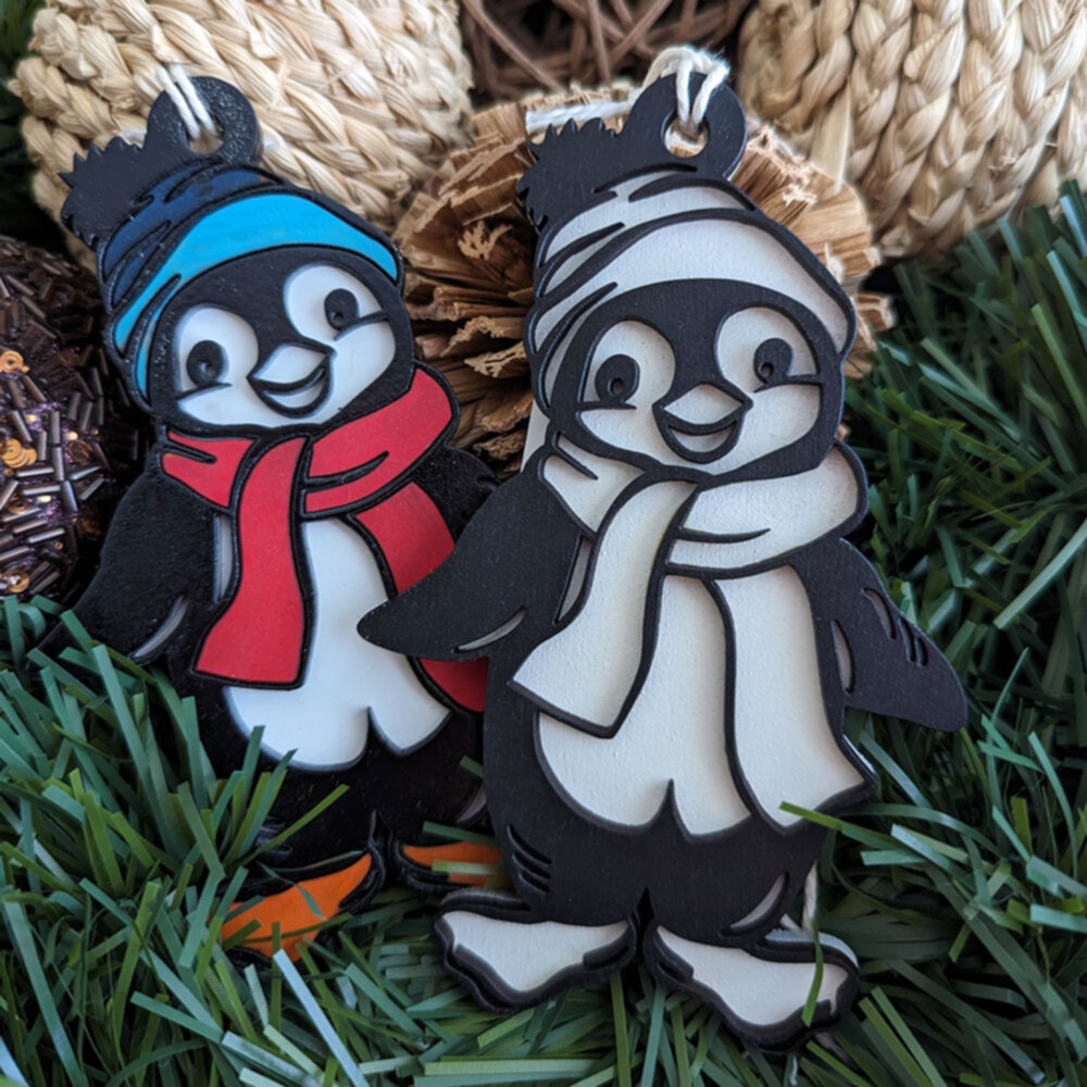 2 penguin christmas ornaments