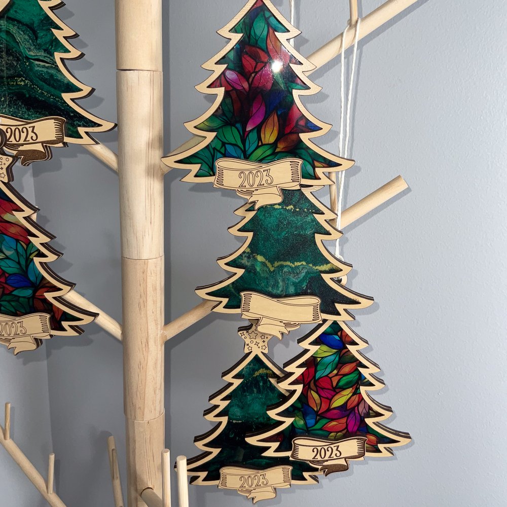 Christmas tree ornaments with colorful inlays.