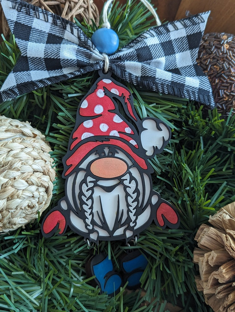 A Red Gnome Shaped Christmas Ornament