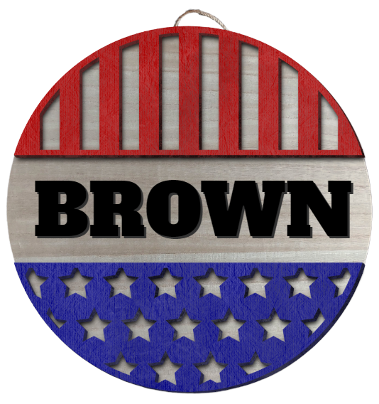 A round sign with the first 1/3 being red with cut out vertical stripes, then the name BROWN in large chunky lettering, then the final third being blue with cut out stars.