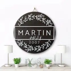 A modern farmhouse styled sign with the words Martin, established 2007