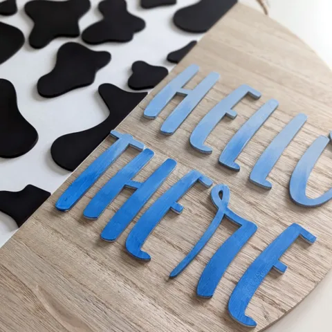 Hello there cow welcome sign