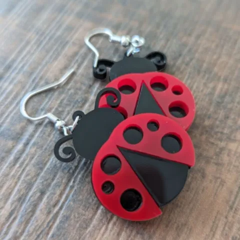 Red acrylic ladybug earrings