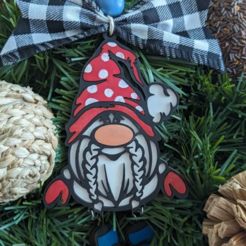 A Red Gnome Shaped Christmas Ornament