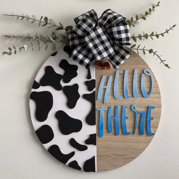 Hello there cow welcome sign