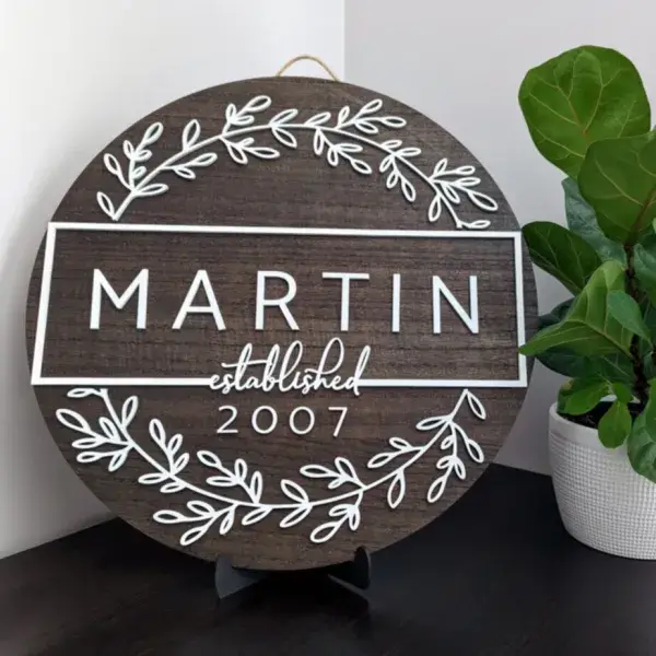 A modern farmhouse styled sign with the words Martin, established 2007