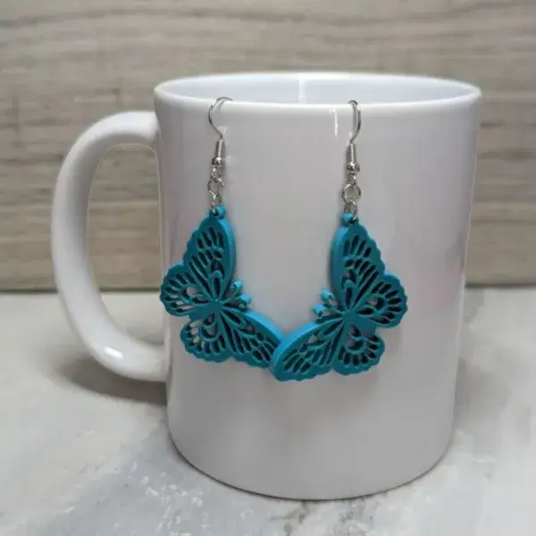 Blue acrylic butterfly earrings