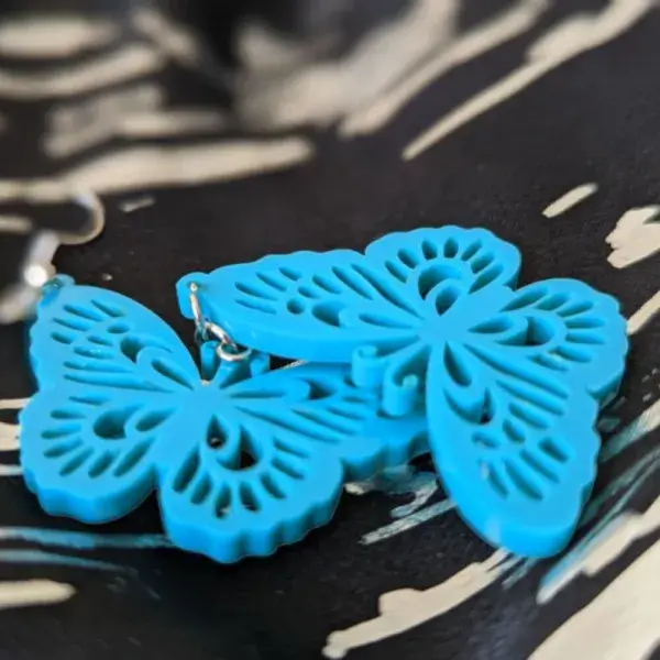 Blue acrylic butterfly earrings